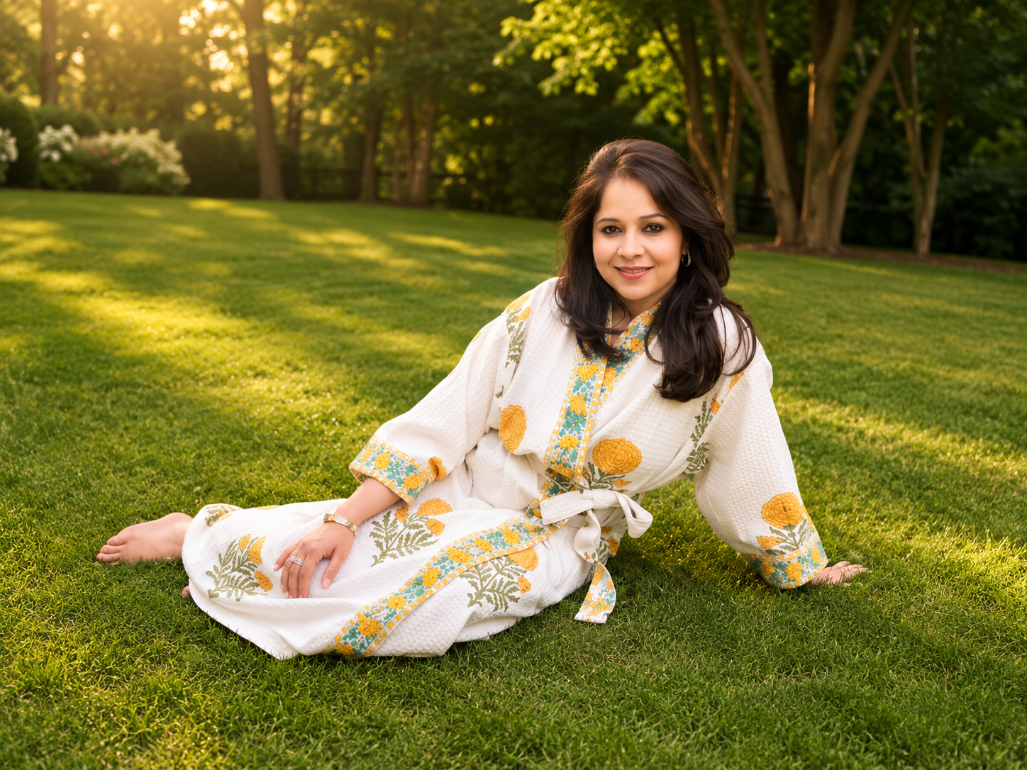 Marigold Garden bathrobe — warm orange and gold floral block print on waffle cotton.