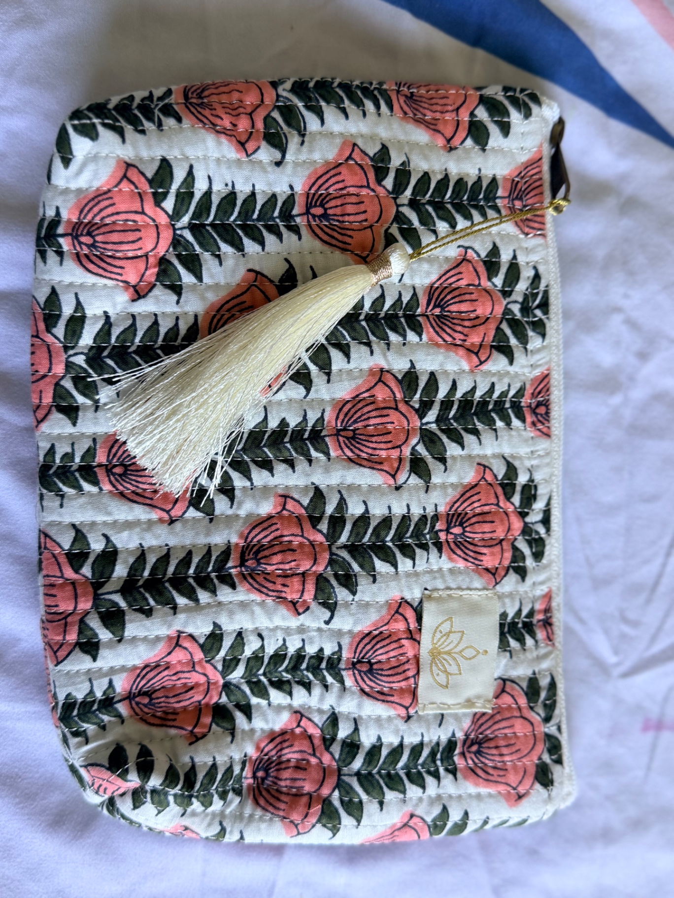 Coral bloom block-print hand-quilted Varnya pouch with silk tassel